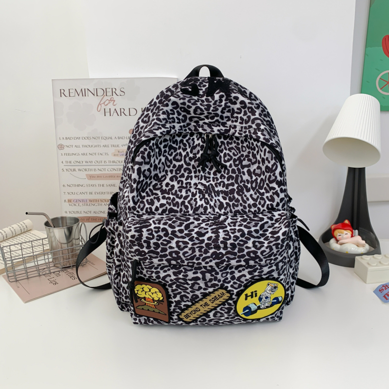 Nylonový batoh s leopardím vzorom, veľká kapacita 36–55 L, kompatibilný s 14-palcovým notebookom, rozšíriteľný, pre unisex každodenné a školské použitie