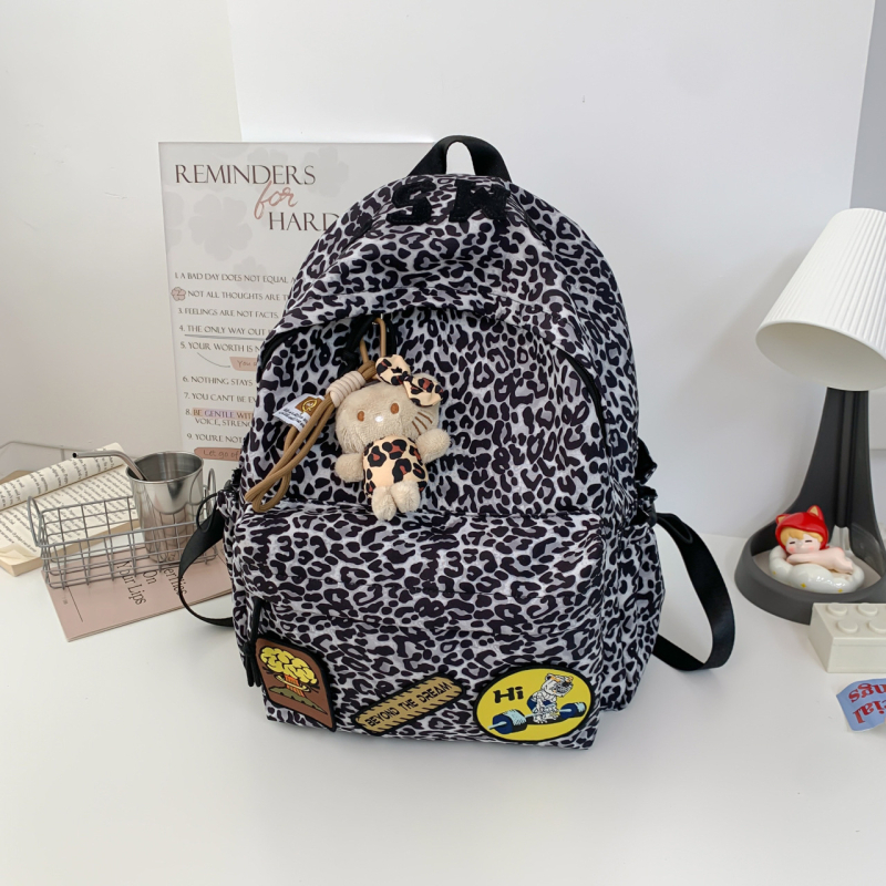 Nylonový batoh s leopardím vzorom, veľká kapacita 36–55 L, kompatibilný s 14-palcovým notebookom, rozšíriteľný, pre unisex každodenné a školské použitie