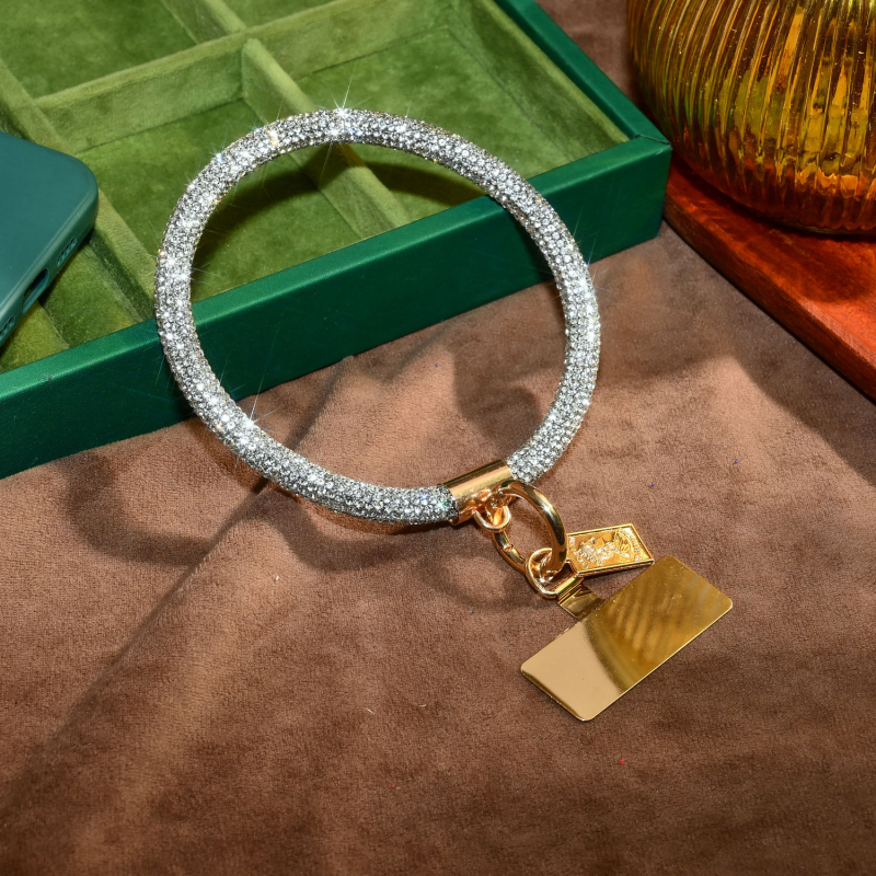 Ланярд за телефон с кристални камъни – ръчна изработка, метална висулка с форма човек, каишка от кристални нишки и метална катарама