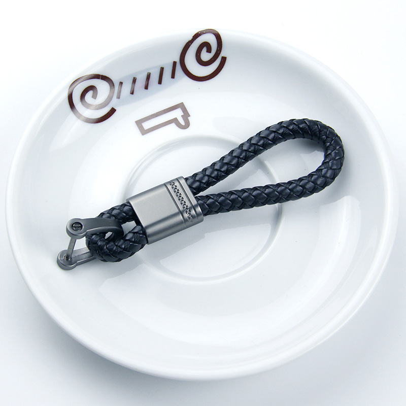 Autókulcstartó fonott zsinórral és pisztoly motívummal, fémből, kompatibilis Mercedes-Benz, BMW, Audi, Volkswagen