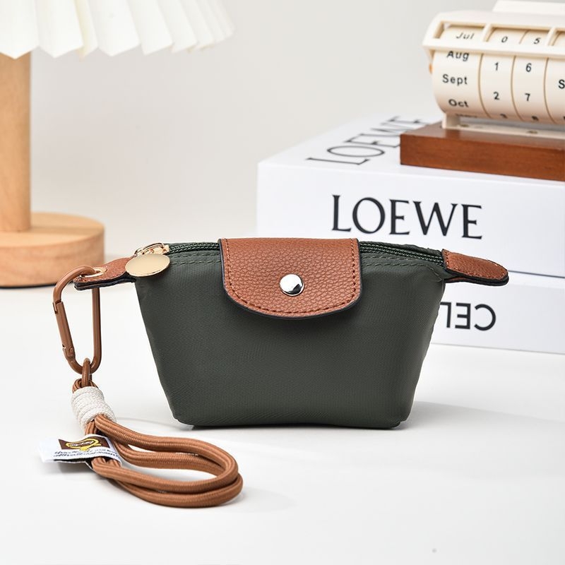 PU háromrekeszes kártyatartó csattal, rajzfilmszerű mintával, városi minimalista stílus, poliészter bélés, 2025 tavaszán debütál