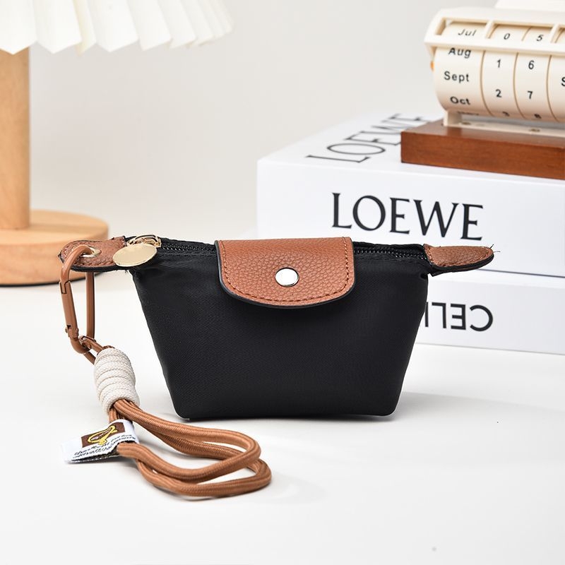 PU háromrekeszes kártyatartó csattal, rajzfilmszerű mintával, városi minimalista stílus, poliészter bélés, 2025 tavaszán debütál