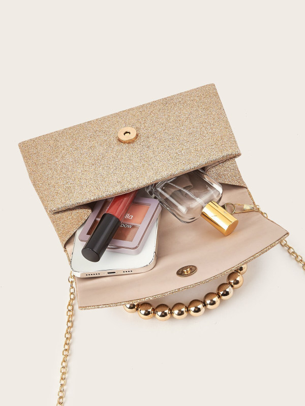 Дамска вечерна клъч чанта с хоризонтална квадратна форма; материал Stretch gold sand cloth, магнитно копче, подплата полиестер, триизмерна чанта.