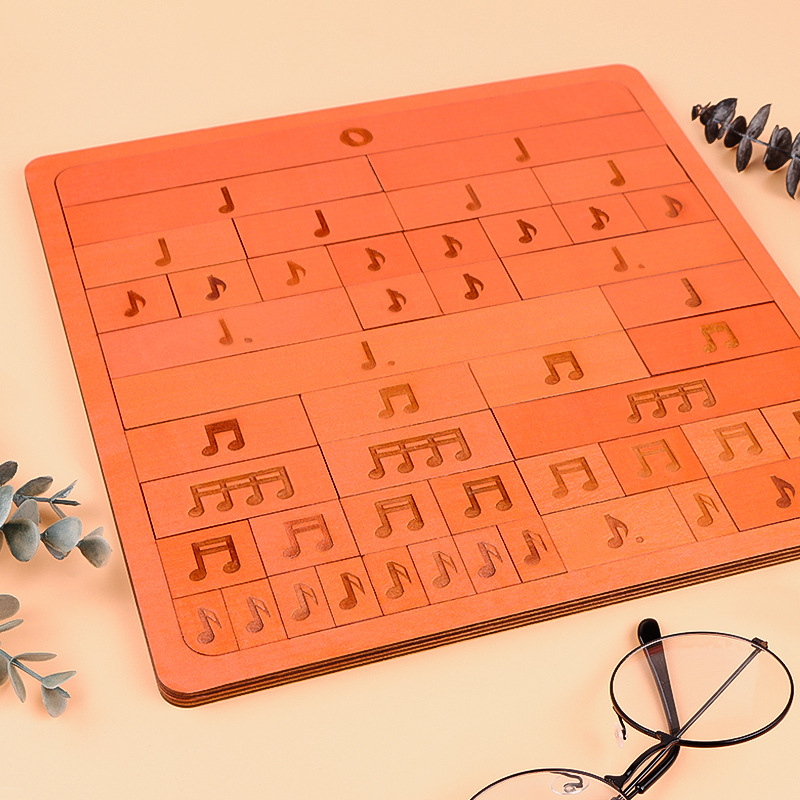 Drveni glazbeni puzzle – notе, ritam i glazbena teorija za početnike; ravni puzzle; materijal: građevinski blokovi; dobna skupina 15–35; kategorija: pravopisne ilustracije, ploče