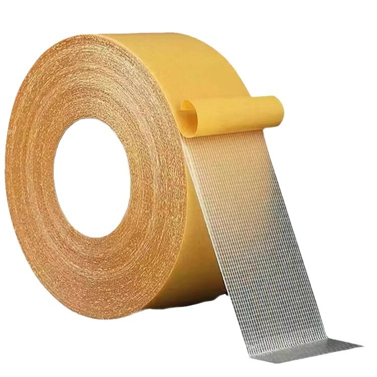 Dvigubos plokščių lipni juosta su tinklo pagrindu kilimams tvirtinti, stiprus lipnumas, be likučių; ilgis 5.1 m (gali būti pritaikomas iki 20.5 m), plotis 8-50 mm, storis 0.28-0.38 mm.