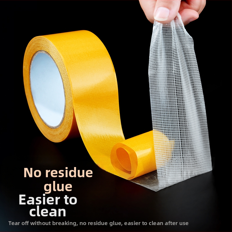 Dvojstranná páska s mrežovou základňou na upevnenie koberca; silný adhézny účinok, bez stôp; dĺžka 5.1 m (možno upraviť na 20.5 m), šírka 8-50 mm, hrúbka 0.28-0.38 mm.