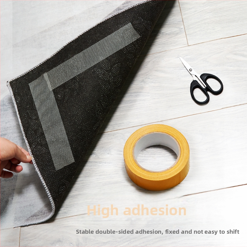 Dvojstranná páska s mrežovou základňou na upevnenie koberca; silný adhézny účinok, bez stôp; dĺžka 5.1 m (možno upraviť na 20.5 m), šírka 8-50 mm, hrúbka 0.28-0.38 mm.