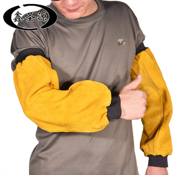 Karvių odos apsauginės rankovės su šilumine izolacija, atsparios nudėvėjimui ir ugniai; įdėklas iš karvių odos; sveria apie 0,4 kg; tinka elektriniam suvirinimui ir lydymui