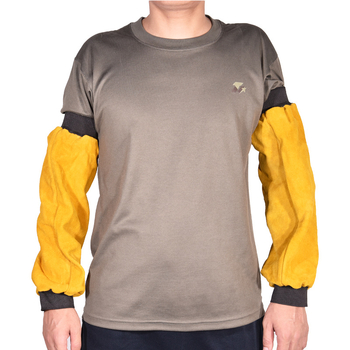 Karvių odos apsauginės rankovės su šilumine izolacija, atsparios nudėvėjimui ir ugniai; įdėklas iš karvių odos; sveria apie 0,4 kg; tinka elektriniam suvirinimui ir lydymui