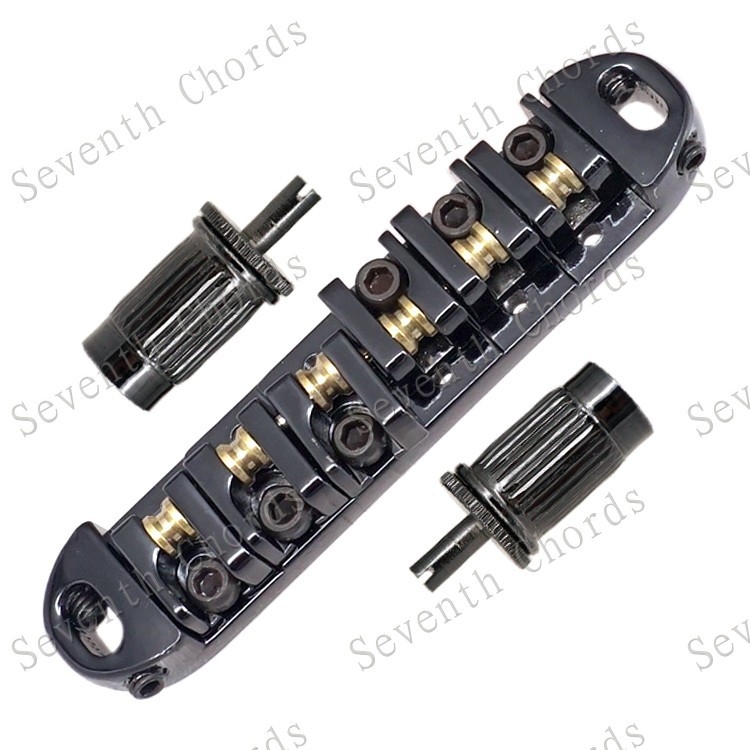 Γέφυρα ηλεκτρικής κιθάρας με κυλίνδρους-μπάλες, πλάκα χορδών και μεγάλες βίδες σύσφιξης; υλικό: κράμα σιδήρου-ψευδάργυρου