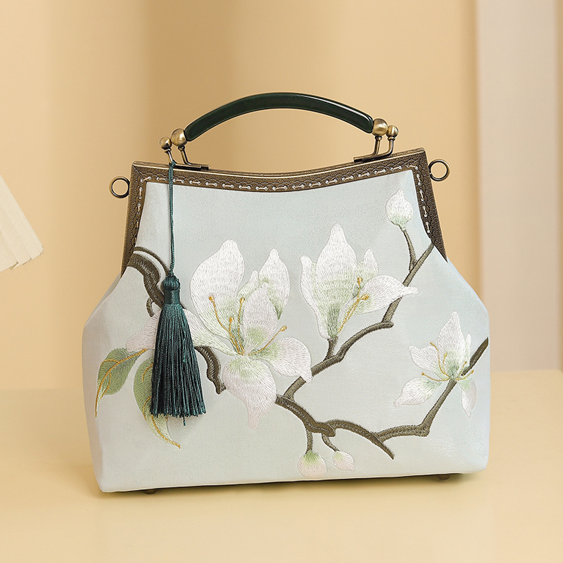 Hímzett kézitáska nemzeti művészeti stílusban; Poliészter anyag; Vízszintes négyzet alakú forma; Kapocszár-zár; Belső ID-zseb közbenső réteggel