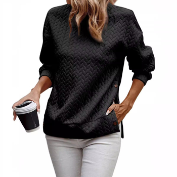 Laza szabású pulóver, kerek nyakú, hosszú ujjú, steppelt poliészter-elasztán anyag (95% poliészter, 5% elasztán)