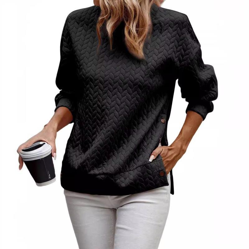 Laza szabású pulóver, kerek nyakú, hosszú ujjú, steppelt poliészter-elasztán anyag (95% poliészter, 5% elasztán)