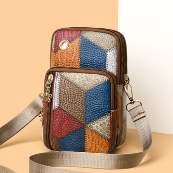 Crossbody telefon táska dupla cipzárral, PU anyagból, horizontálisan négyszögletes forma, belső telefonrekesz, egy vállpánt