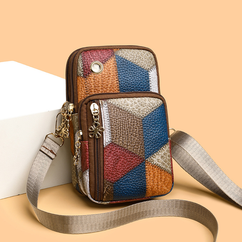 Crossbody telefon táska dupla cipzárral, PU anyagból, horizontálisan négyszögletes forma, belső telefonrekesz, egy vállpánt