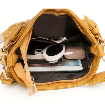 Női valódi bőrből készült váll- és keresztpántos táska, függőleges négyzetes formájú, cipzáras nyitás, belső cipzáras zseb, tehénbőr belső bélés, egyszeres vállpánt, 2025 nyár kiadás