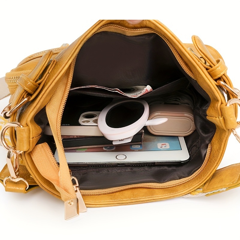 Női valódi bőrből készült váll- és keresztpántos táska, függőleges négyzetes formájú, cipzáras nyitás, belső cipzáras zseb, tehénbőr belső bélés, egyszeres vállpánt, 2025 nyár kiadás