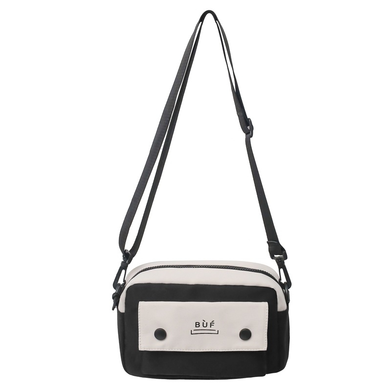 Nylon crossbody torba s urbanim minimalistickim dizajnom, velika kapaciteta, vodoravno kvadratnog oblika, zatvaranje na zip, podstava od poliestera, unutarnji džepovi: zip džep, džep za telefon i ID džep
