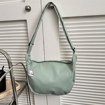 Ženska torba preko ramena u street-trend stilu, najlon, dumpling oblik, zatvarač, podstava poliester