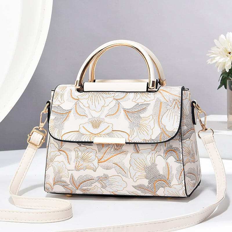 Ženska crossbody torbica, PU materijal, horizontalnog kvadratnog oblika, zatvaranje na zip, laminirana unutarnja džep, jedna naramenica