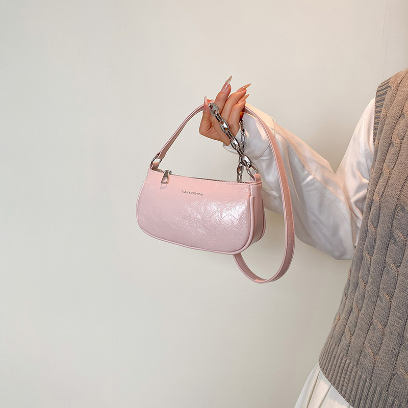 Crossbody torba kvadratnog oblika, PU materijal, zatvarač, unutarnji džep, podstava od poliestera