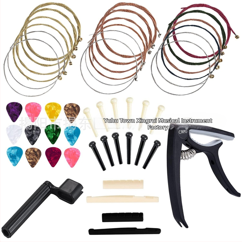 Комплект китарни аксесоари: струни, медиатори, капо, тунер и инструмент за смяна на струни в чанта; Материал: метал+електроника+ABS; Марка: XR; За западни струнни инструменти