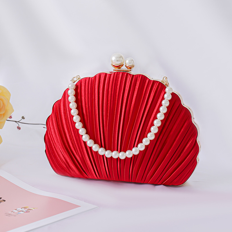Večernja clutch torbica od svile, školjkasti oblik, satenska podstava, zatvaranje klipsom