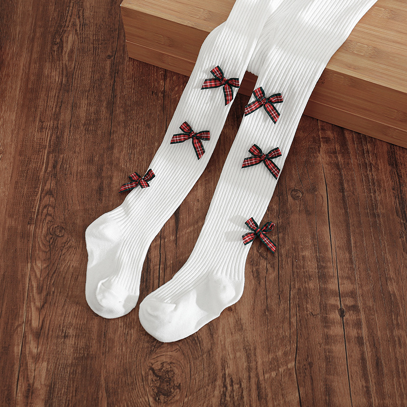 Vaikų kojinės su kojomis ir kaspinėliu, aukštas liemuo, elastinės, 83% medvilnė, kvėpuojančios ir prakaitą sugeriančios, storintos, 1–3 metų amžiaus, pavasaris–ruduo