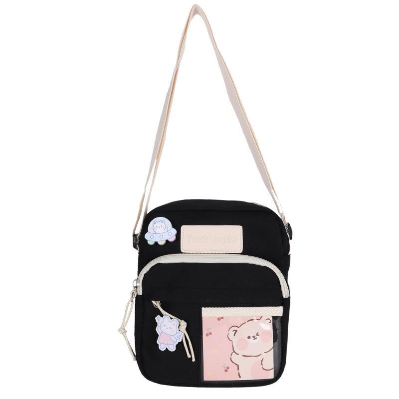 Najlon crossbody torba, vertikalni kvadratni oblik, zatvaranje na zip, džepovi za telefon i osobnu iskaznicu, s jednom naramenicom