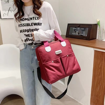 Kompaktna putna torba s crossbody remenom, vodootporan Oxford materijal, kapacitet ispod 20L, ultra lagana i sklopiva