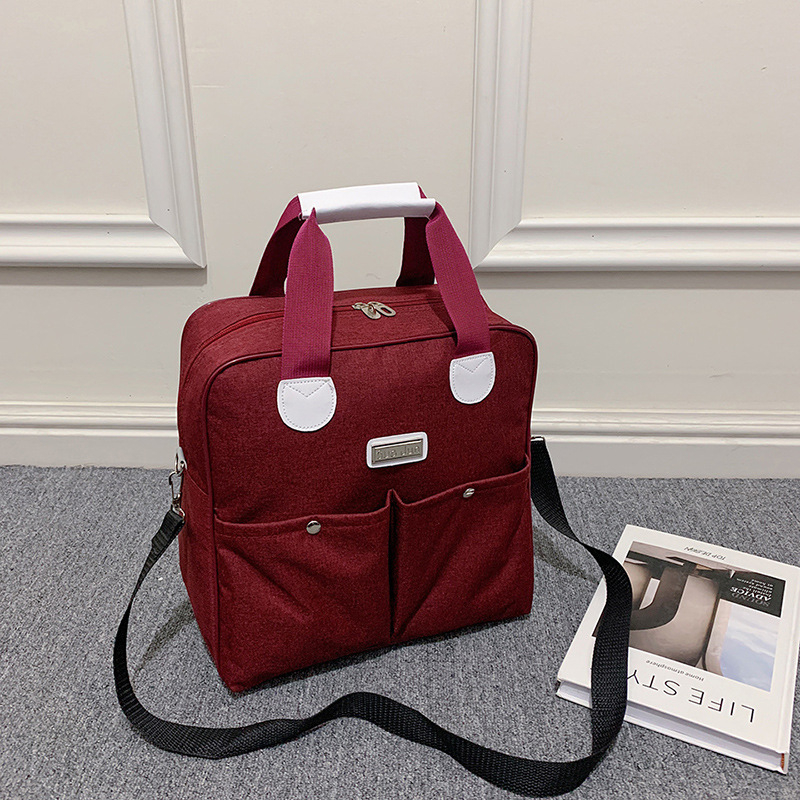 Kompaktna putna torba s crossbody remenom, vodootporan Oxford materijal, kapacitet ispod 20L, ultra lagana i sklopiva