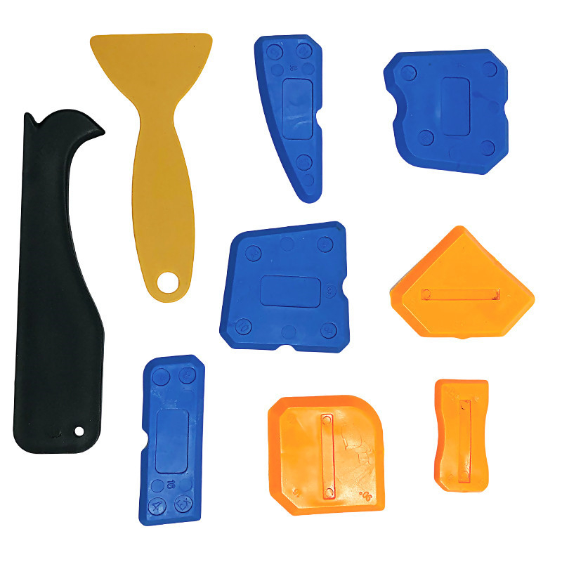 9-dijelni set: kutni scraper, razdjelič ljepila, scraper spojeva stakla, alat za spojeve pločica; materijal: plastika + silikon