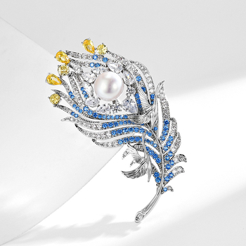 Γυναικεία καρφίτσα με φτερό και μαργαριράκι – μέταλλο, ηλεκτροπλατίωση φινίρισμα, κυκλοφορία χειμώνας 2024, διακοσμητικό αξεσουάρ