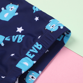 Παιδικό μαγιό με μακριά μανίκια, γρήγορο στέγνωμα, δύο τεμάχια, μποξερ στυλ; ηλικία 4–16 ετών, αρσενικό; μοτίβο καρτούν; 85% πολυεστέρας / 15% ελαστάνη, 190G; επένδυση 100% πολυεστέρας.