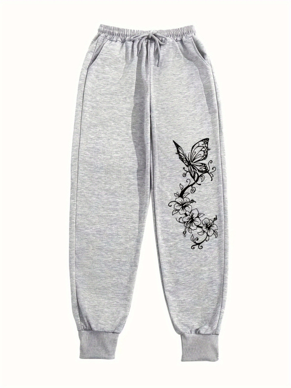 Moterų spausdintos sportinės kelnės su raišteliu, laisvas kirpimas, elastus juosmuo, poliesteris 50–70%, vidutinio storio, pavasaris 2025