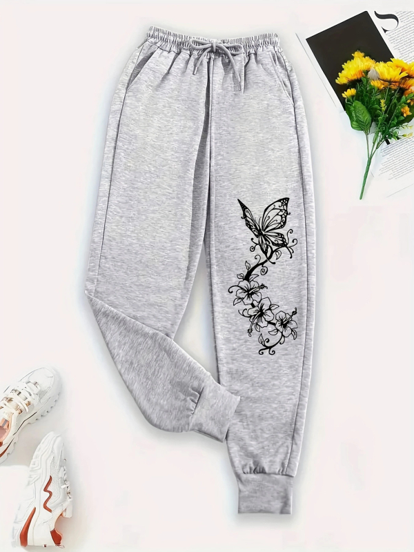 Moterų spausdintos sportinės kelnės su raišteliu, laisvas kirpimas, elastus juosmuo, poliesteris 50–70%, vidutinio storio, pavasaris 2025