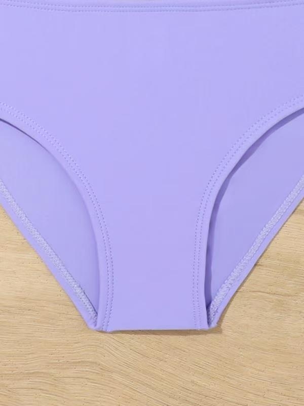 A Lányoknak készült két részes gyerek fürdőruha virágos mintával, magas rugalmassággal, poliészter 85/15, anyagsúly 200 g, bélés 100% poliészter