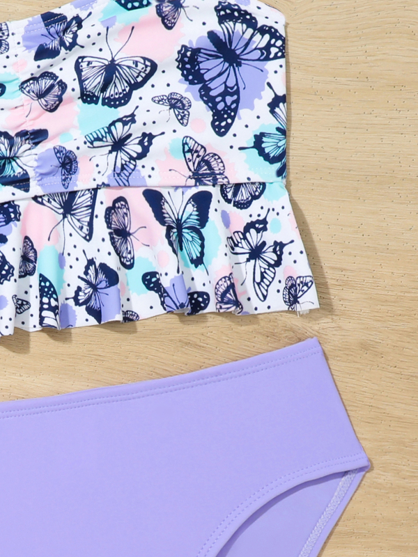 A Lányoknak készült két részes gyerek fürdőruha virágos mintával, magas rugalmassággal, poliészter 85/15, anyagsúly 200 g, bélés 100% poliészter