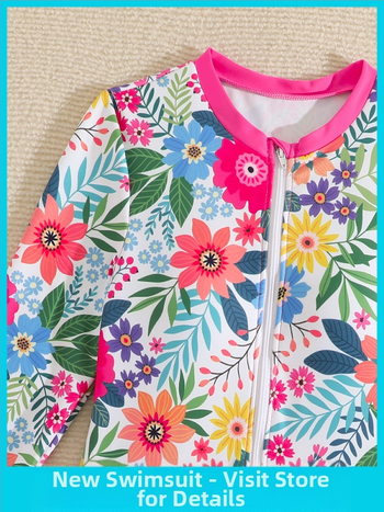 Κοριτσίστικo μαγιό με μακρύ μανίκι για προστασία από τον ήλιο, σχέδιο με σπασμένα λουλούδια, ύφασμα 82% πολυεστέρας, επένδυση 18% σπαντέξ, βάρος 150 g, κατάλληλο για κολύμβηση και θαλάσσιες δραστηριότητες