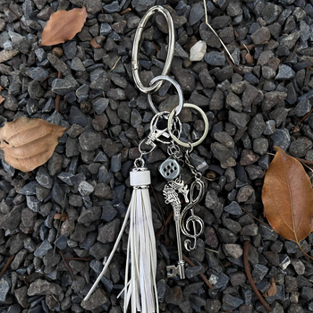 Κρεμαστό τσάντας με φούντα και μοτίβο μουσικής νότας, σχεδιασμένο με έμπνευση από τον ωκεανό (Υλικό: κράμα; Στυλ: INS στυλ, κρεμαστό για τσάντα; Λανσάρισμα: Άνοιξη 2025; Κατηγοριοποίηση στυλ: προσωπική τάση)