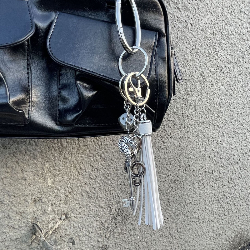 Táskadísz tassel motívummal, óceán ihletett dizájn (Anyag: ötvözet; Stílus: INS stílus, táskadísz; Kiadás: 2025 tavasza; Stílus besorolás: személyes tendencia)