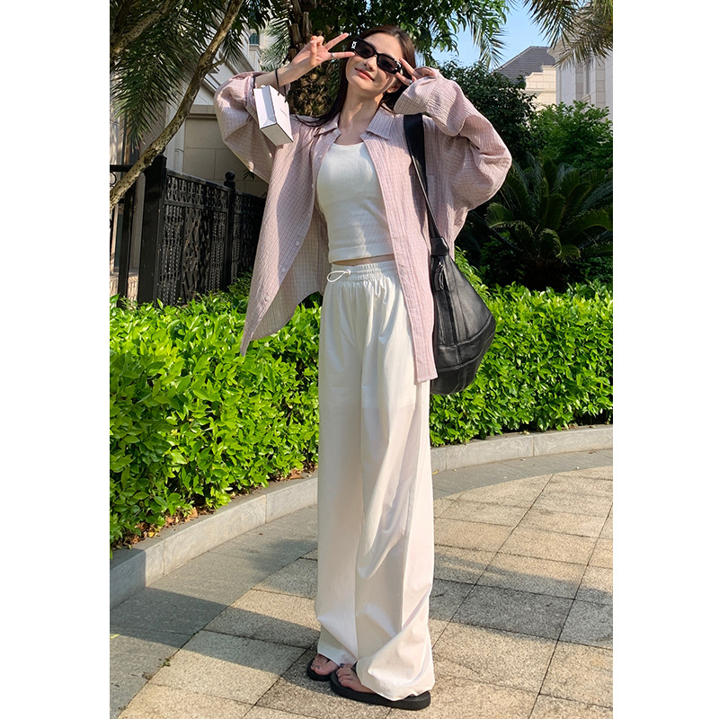 Női casual nadrág, laza szabású, magas derekú; könnyű keverék Lyocell (Tencel) és pamut, 50–70% mindkét összetevő; hosszú nadrág; ősz 2025; japán–koreai leisure stílus; nem elasztikus anyag; formázás magas hőmérsékleten.