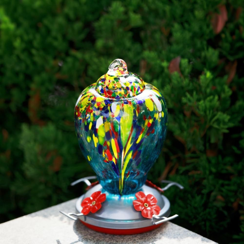 Stiklinė vandens lesyklėlė paukščiams su dažytu stiklo/plastiko gėlių akcentu