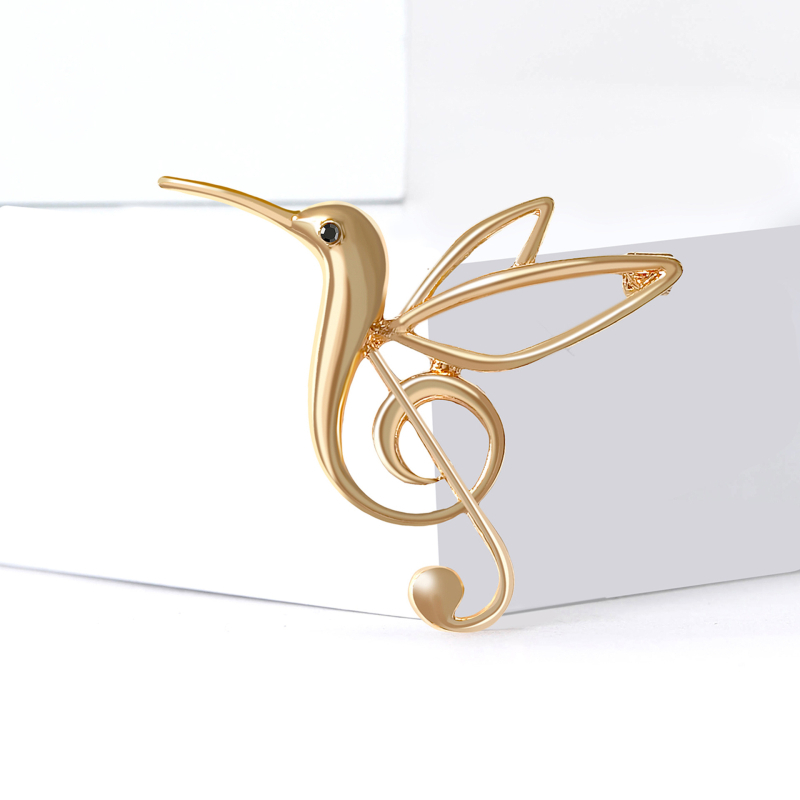 Брошка от сплав със емайл — колибри и музикална нота, инкрустирана с диаманти