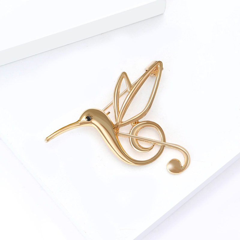 Брошка от сплав със емайл — колибри и музикална нота, инкрустирана с диаманти