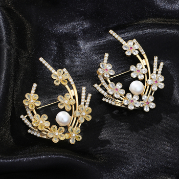 Cuprinė segė gėlės formos su cirkono įdėklu ir ametisto kristalais