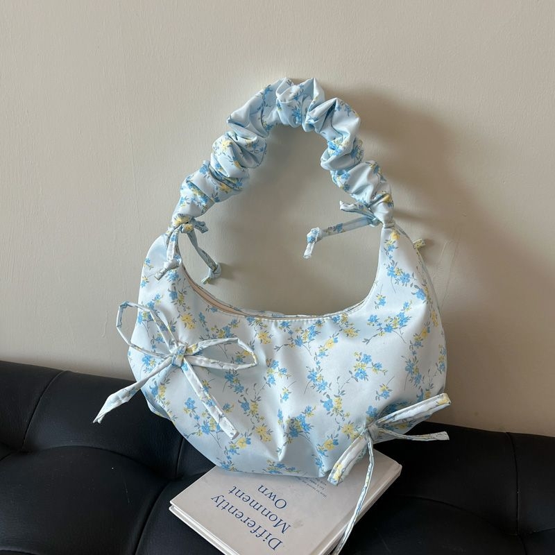 Női vászon táska masnival — dumpling alak, Oxford anyag, cipzáras zárás, poliészter bélés, mobiltelefon rekesz, tavasz 2025