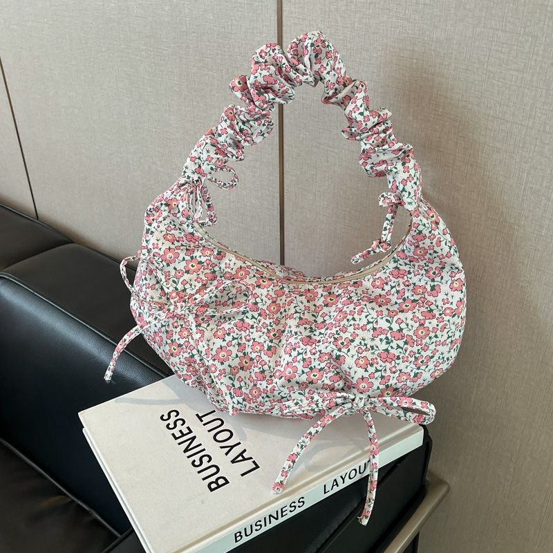 Női vászon táska masnival — dumpling alak, Oxford anyag, cipzáras zárás, poliészter bélés, mobiltelefon rekesz, tavasz 2025