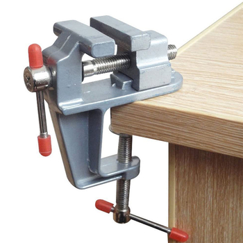 Mini universalus stalinis spaustukas su įrankio plieninėmis žnyplėmis, plastikinis rankena, sveria 153 g