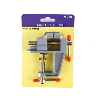 Mini universalus stalinis spaustukas su įrankio plieninėmis žnyplėmis, plastikinis rankena, sveria 153 g